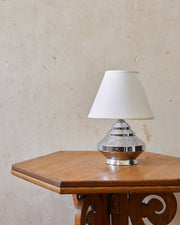 A tiered lamp in the style of George Halais image 0