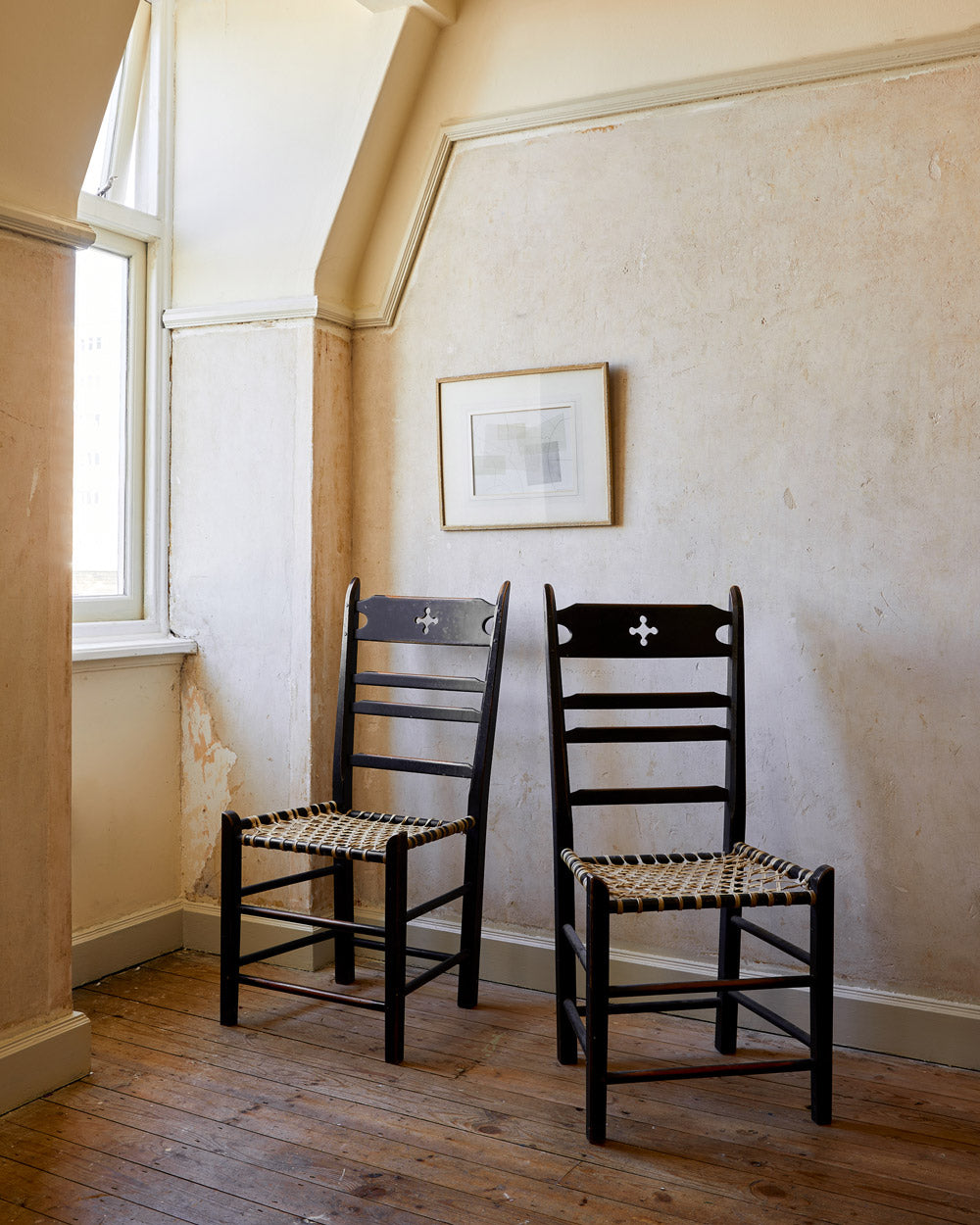 A pair of very rare ebonised ladder backs chairs image 0